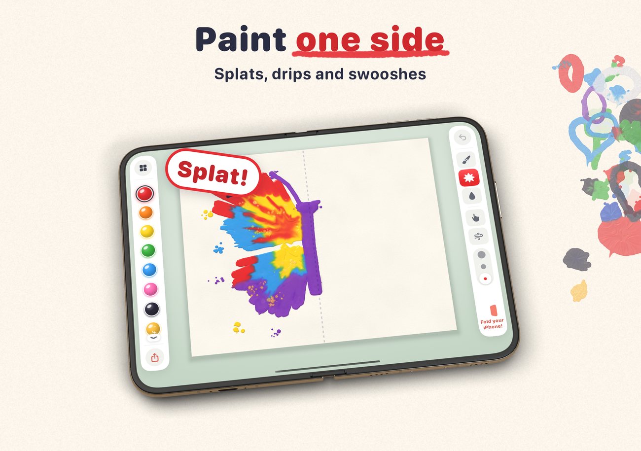 An open iPhone Duo with paint splats and drips on one half of the page.