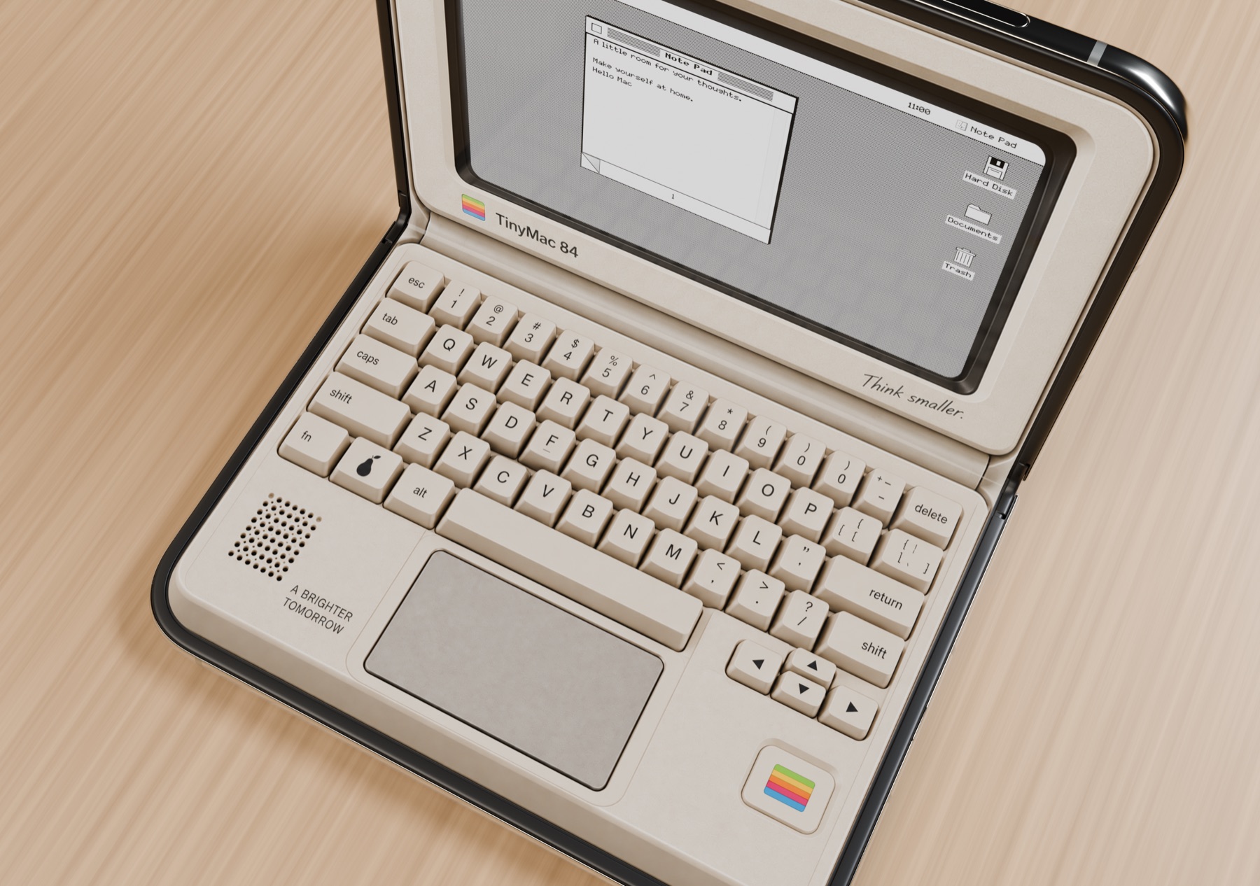 A close view of a miniature computer keyboard and desktop on an open iPhone Duo.